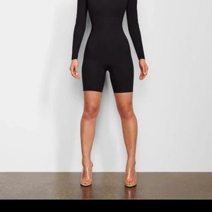 Skims mock neck long sleeve shorts romper